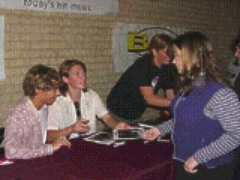 Signing autographs